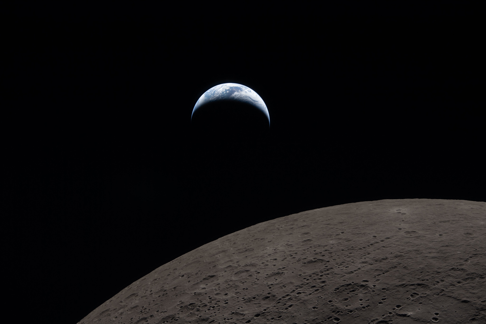 Earthset captured through the Orion spacecraft window
